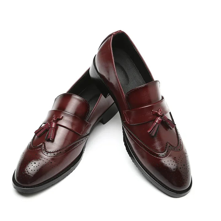 Pair of Imperium Men's Tassel Loafers, elegant leather shoes with classic brogue styling