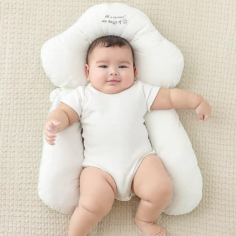 Newborn organic cotton head support pillow, U-shape for gentle sleep, essential baby comfort aid.
