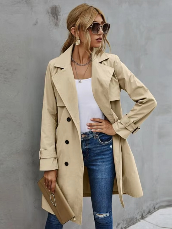 Khaki double-breasted trench coat for women with belted waist, perfect for fall fashion outerwear