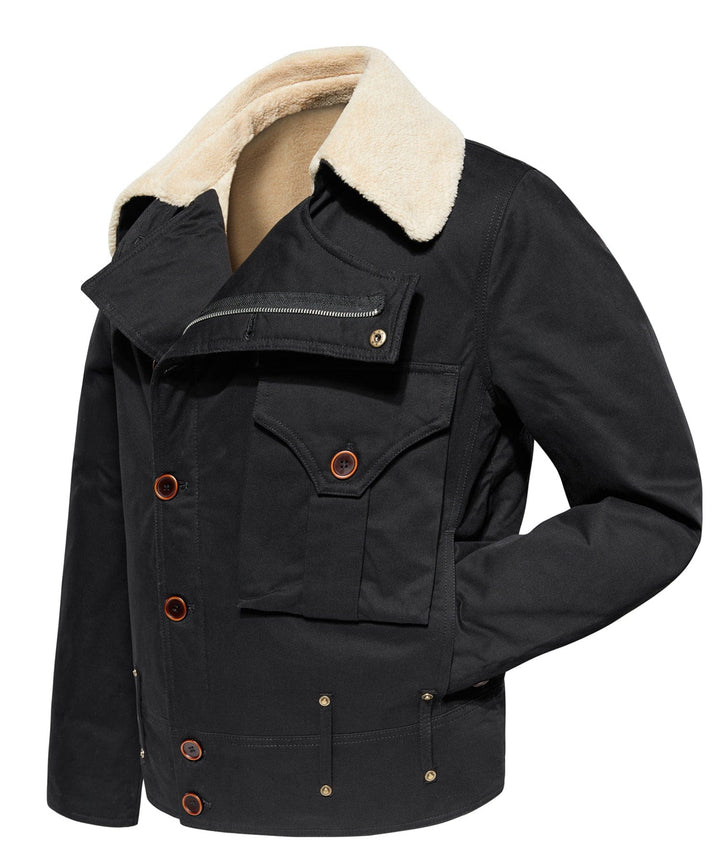 Man wearing a rugged black aviator canvas jacket, showcasing fit and style