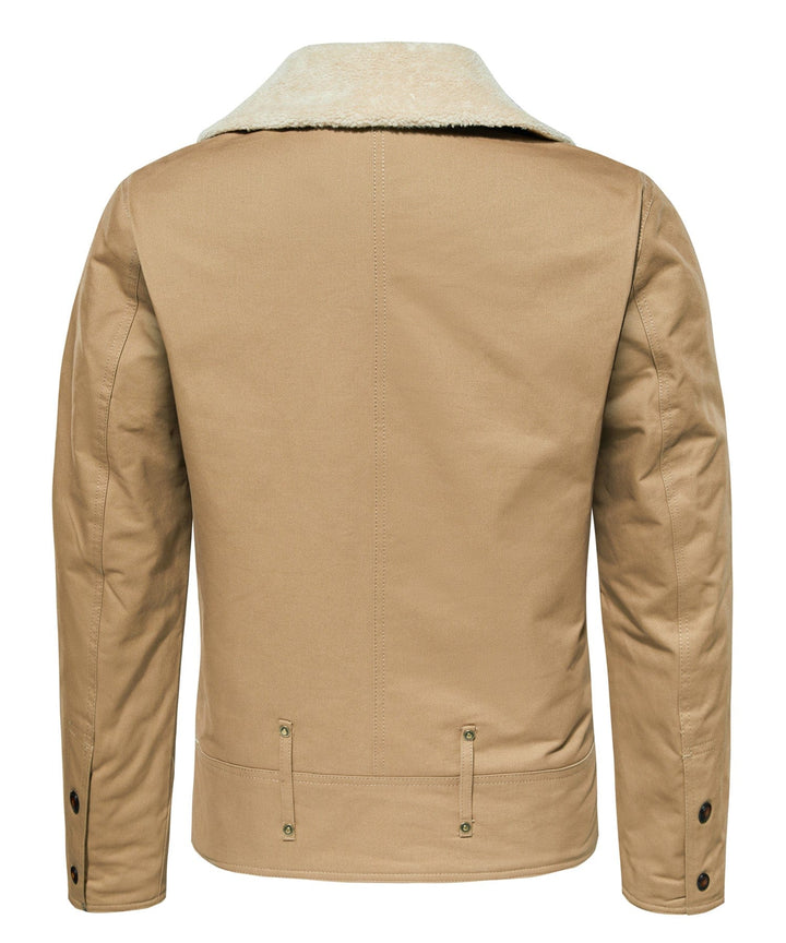 Close-up of collar and shoulder detail on a men's rugged canvas aviator jacket