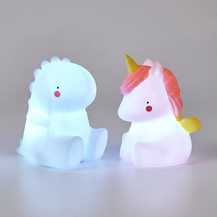 Dreamasaur dinosaur LED night light, a cute animal lamp, perfect for kids' bedrooms & nursery decor with gentle glow.