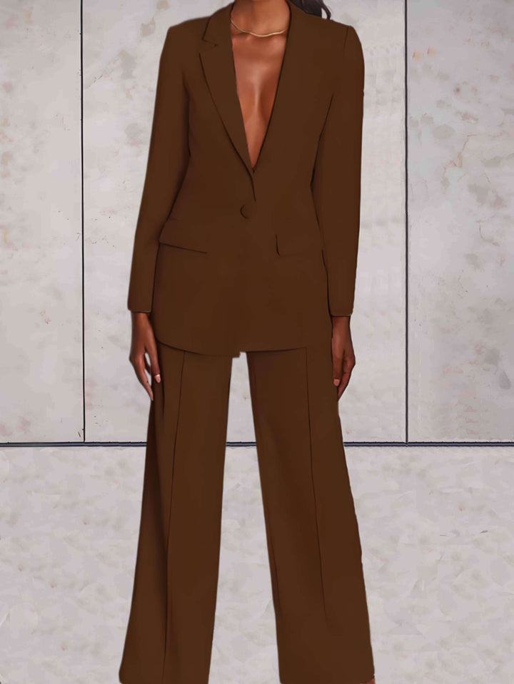 Chic women's fall/winter business set: elegant blazer & wide-leg pants for a professional, sophisticated look.