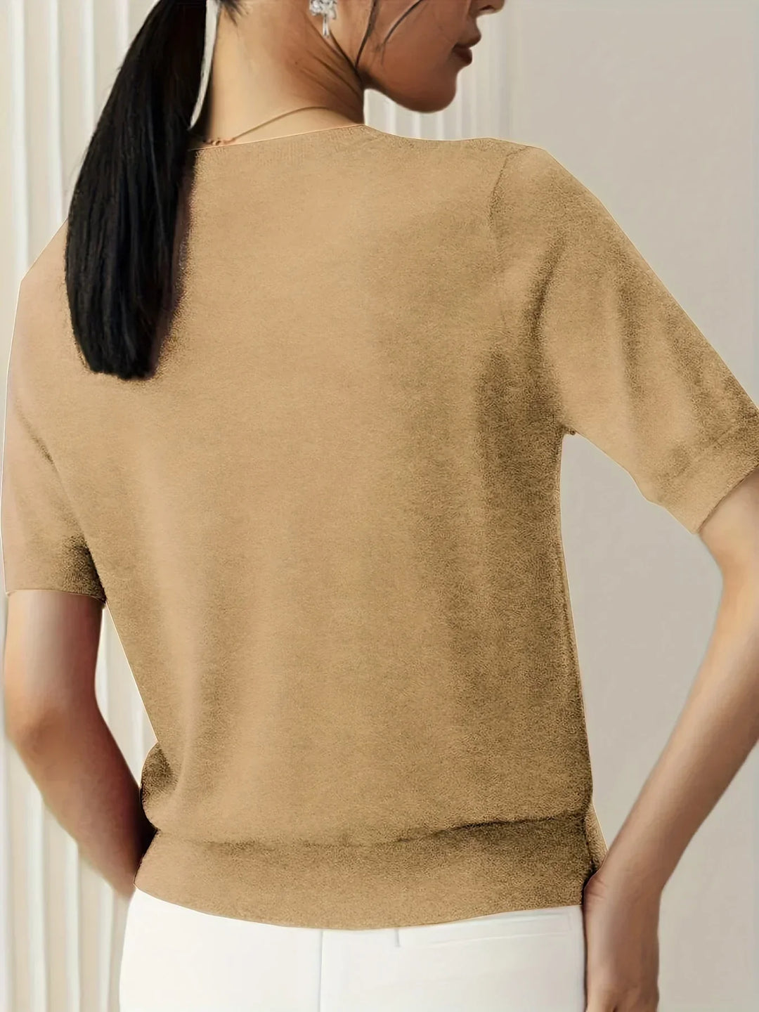 Essential short sleeve ladies' top, perfect lightweight knit for spring outfits.