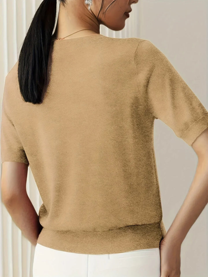 Essential short sleeve ladies' top, perfect lightweight knit for spring outfits.