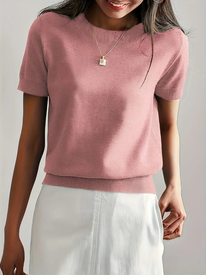 Versatile short sleeve knit top, ideal for women's spring fashion and comfort.