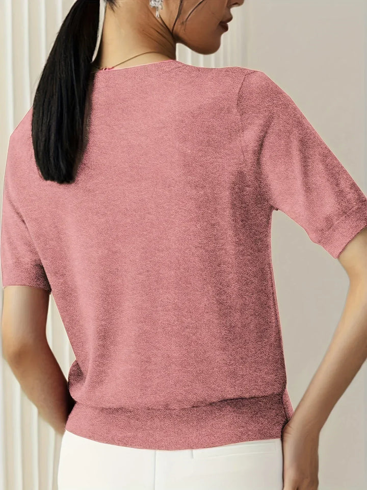 Lightweight women's spring sweater, short sleeve design for a chic casual look.