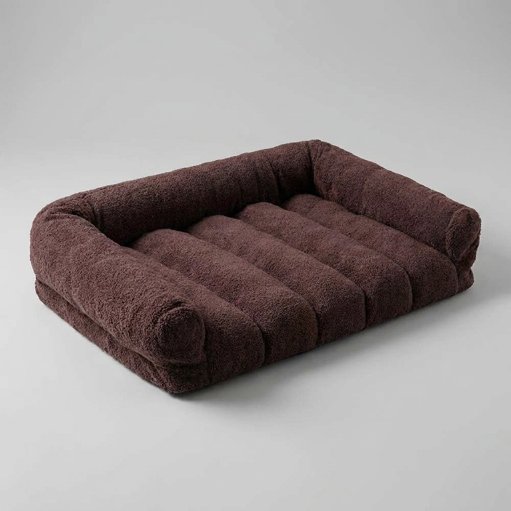 Soft fleece orthopedic cat bed with bolster and headrest, offering cozy joint support for your pet's comfort.