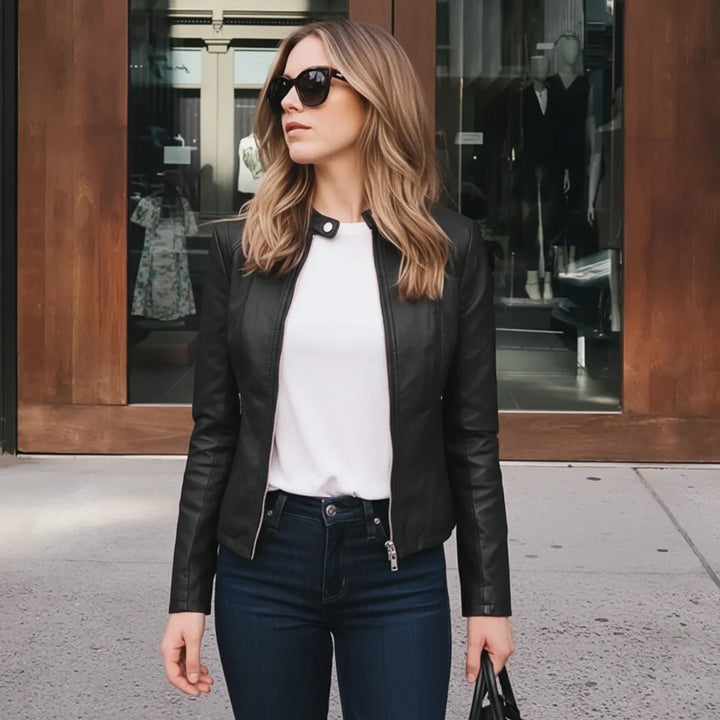 Chic women's collarless zip-up jacket. Modern, sophisticated outerwear perfect for layering.