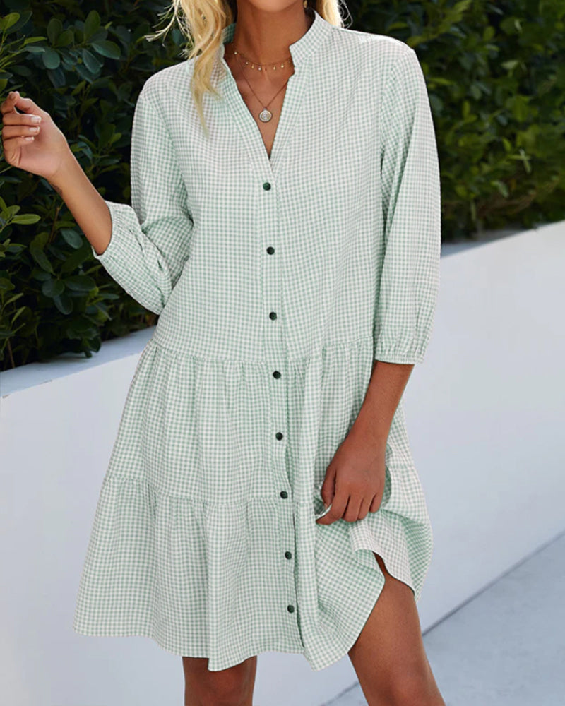 Flattering A-line women's dress with classic checked pattern. Elegant summer style, effortless.