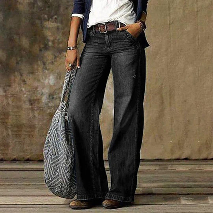 Trendy light blue women's denim jeans, featuring a high waist and wide-leg design