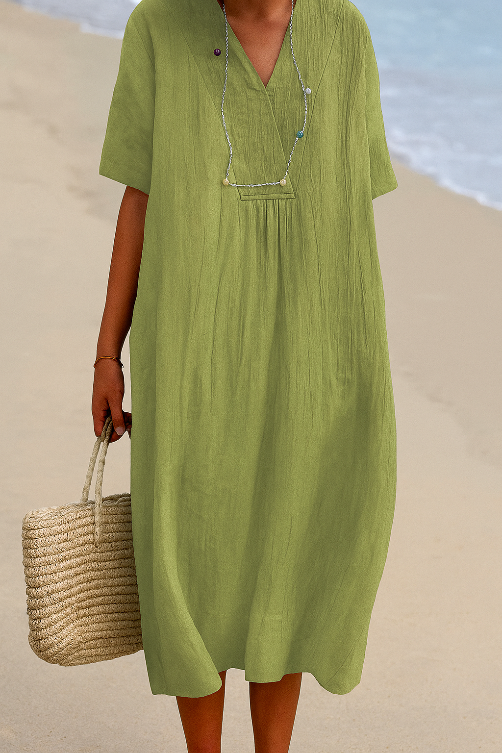 Stylish beige relaxed fit V-neck short sleeve dress for women. Great as a casual beach or vacation outfit.