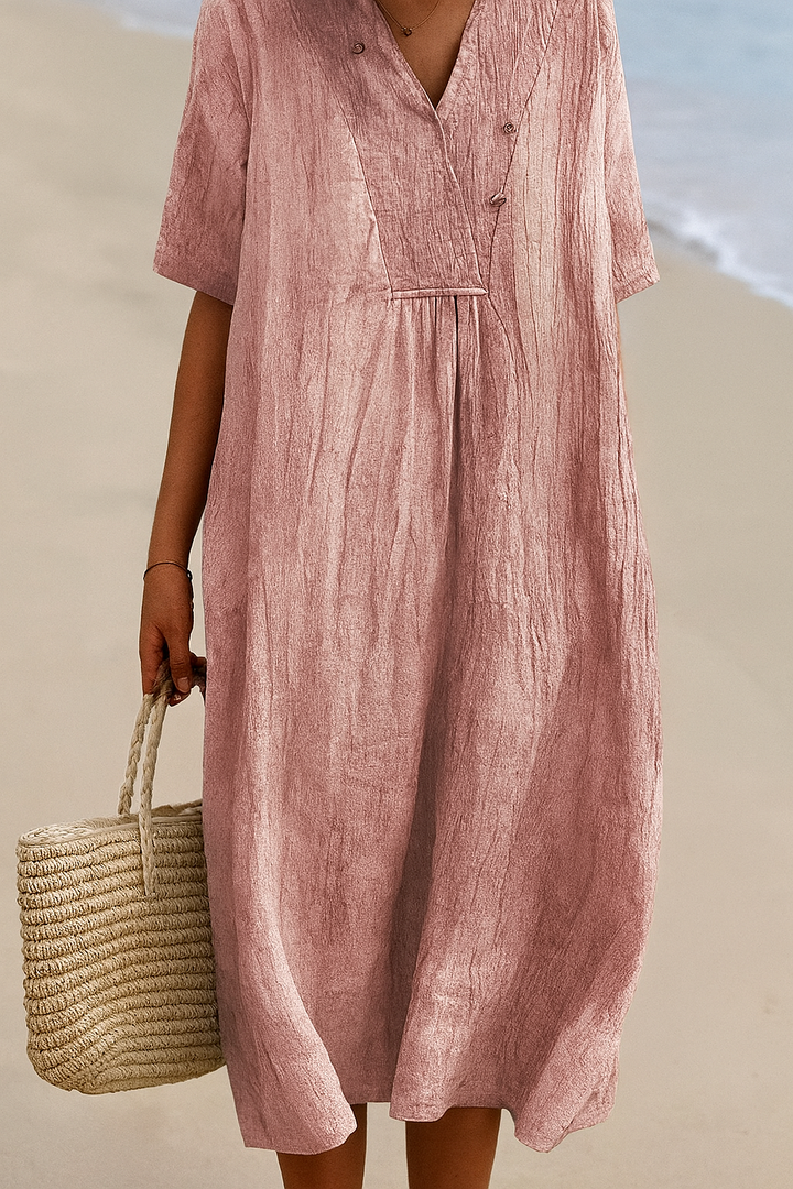 Comfortable gray women's relaxed V-neck short sleeve dress. Perfect flowy vacation or summer resort wear.