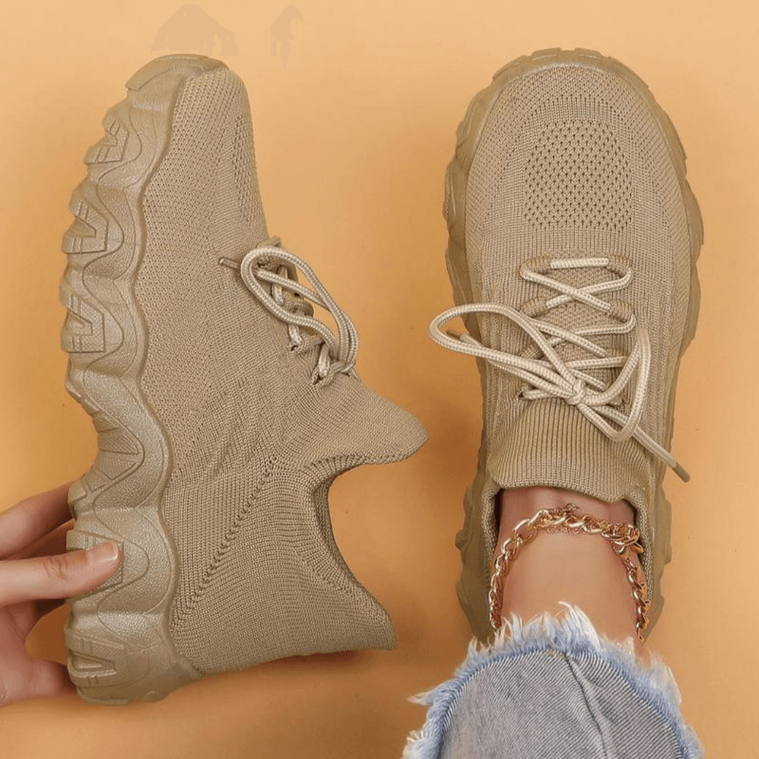 Light brown unisex orthopedic comfort shoes, providing arch support for all-day wear.