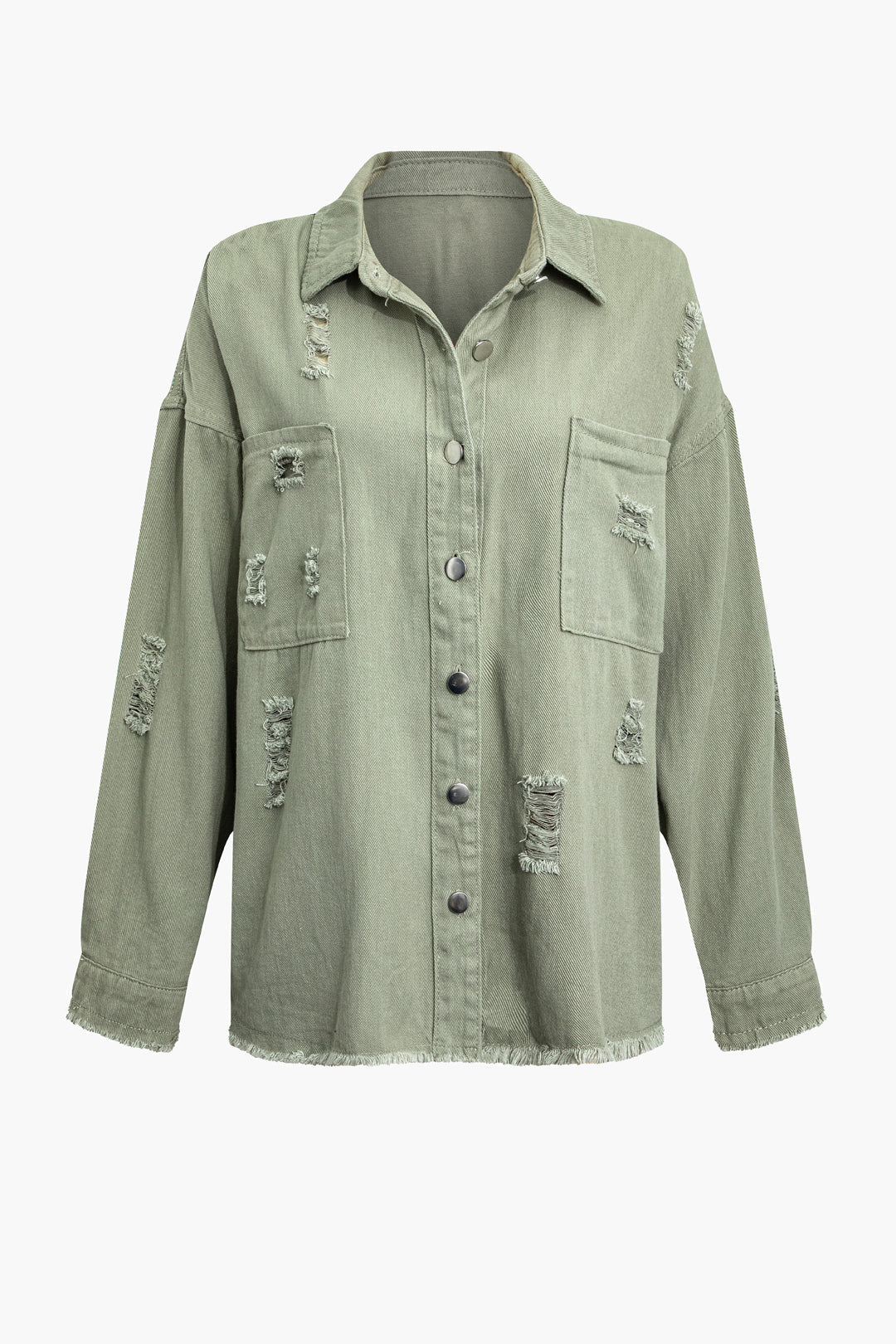 Stylish woman wearing a light green distressed denim jacket, oversized and perfect for casual summer outings.