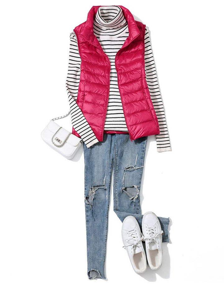 Women's layering quilted vest, a lightweight and comfortable outerwear piece for transitional weather.