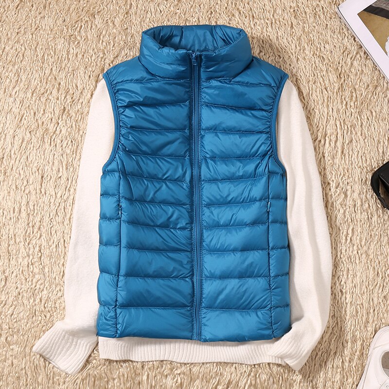 Stylish women's quilted vest, a versatile lightweight sleeveless jacket for casual or travel wear.