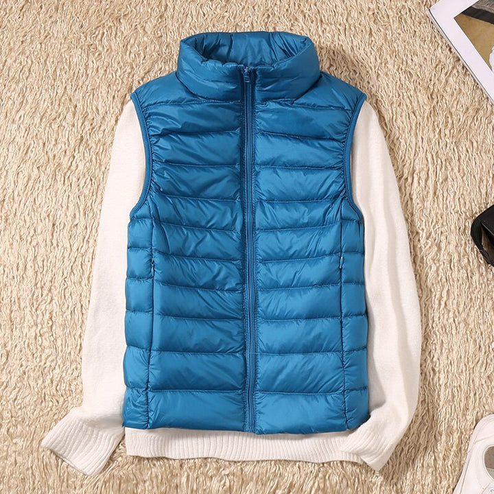 Stylish women's quilted vest, a versatile lightweight sleeveless jacket for casual or travel wear.