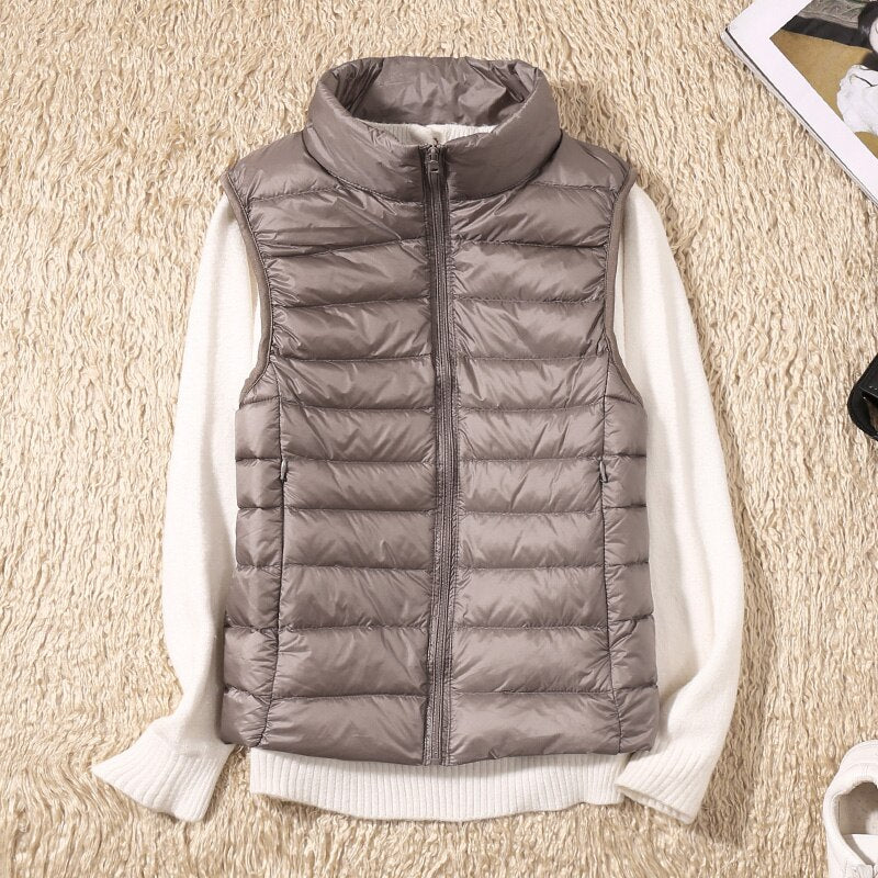 Casual women's quilted sleeveless jacket, offering lightweight warmth and a flattering feminine fit.