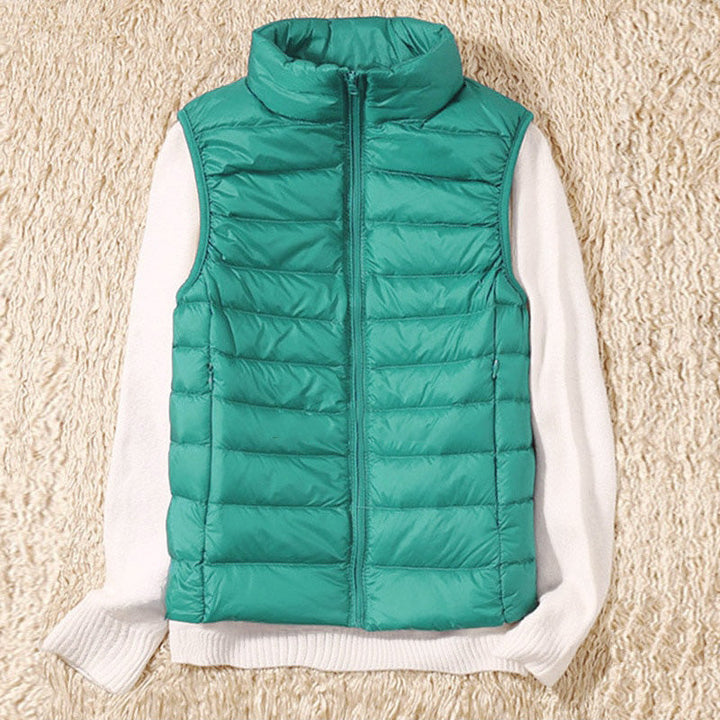 Elegant Juliette quilted vest for women, ideal as a lightweight layering piece for spring and fall fashion.