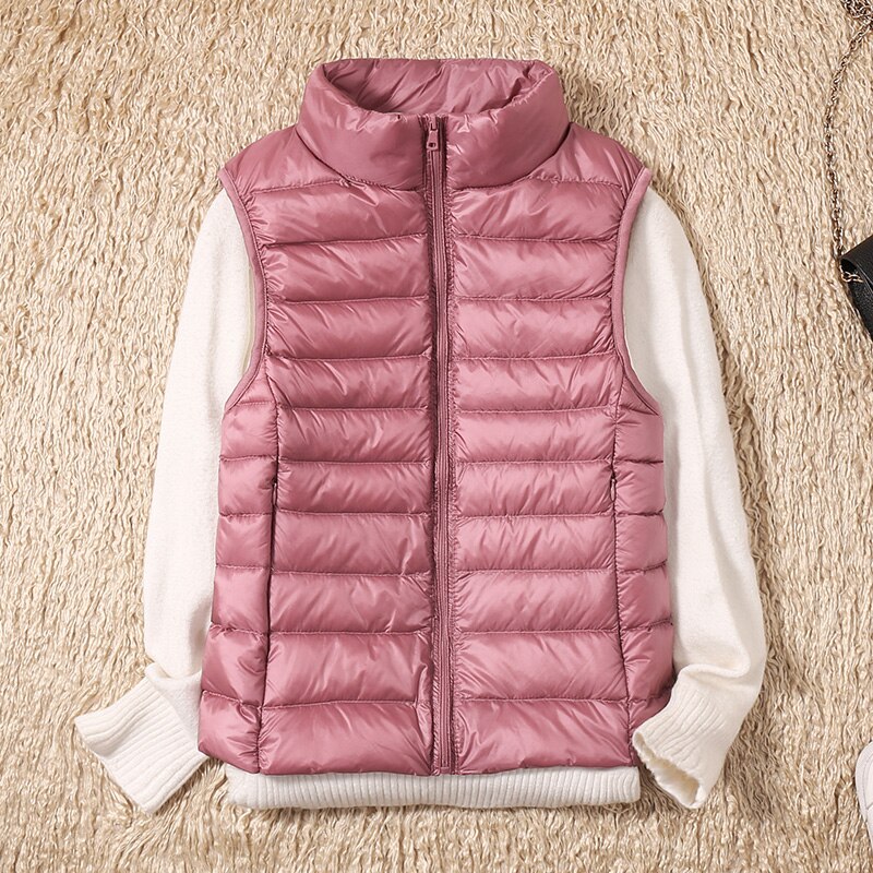 Lightweight women's vest with diamond quilting, a perfect outdoor layering piece for active women.