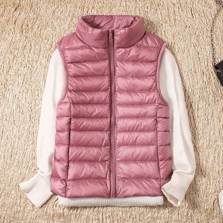 Lightweight women's vest with diamond quilting, a perfect outdoor layering piece for active women.