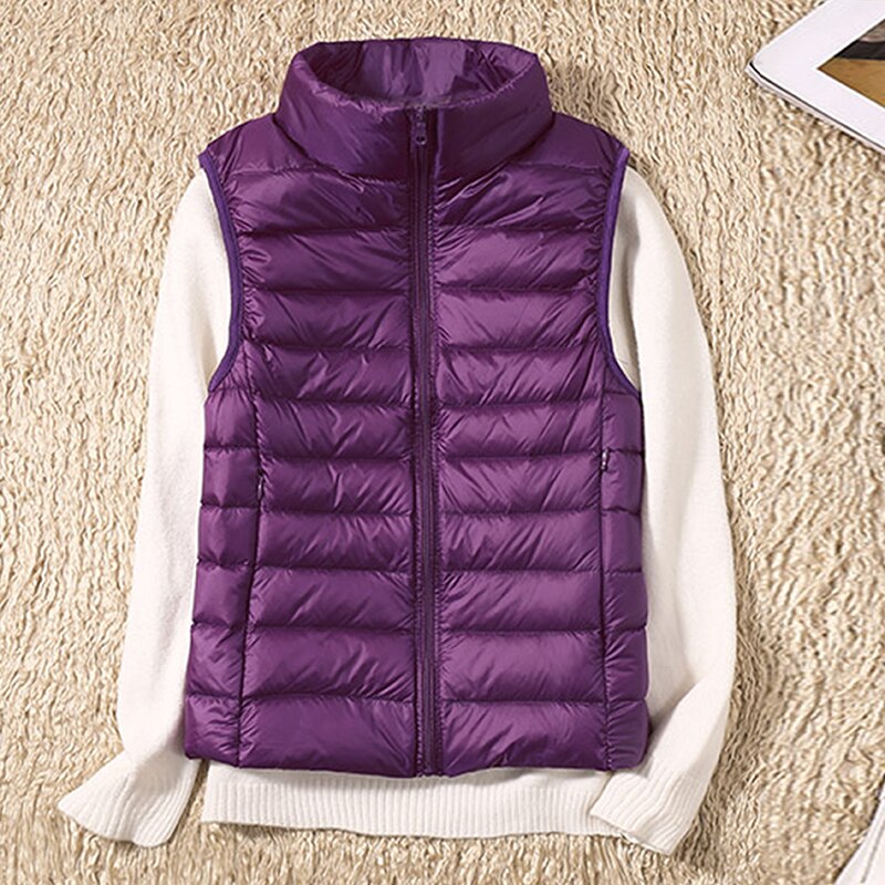 Chic women's travel vest, a lightweight quilted outerwear option for versatile spring and fall style.