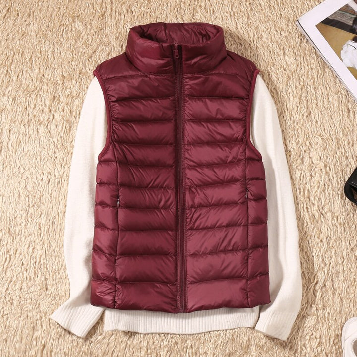 Fashionable women's quilted vest, designed for easy layering and a sleek look in various colors.