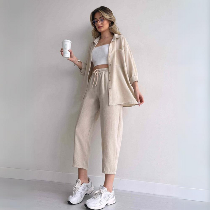 Chic women's linen two-piece set featuring a loose-fit blouse and wide-leg pants, ideal for summer fashion.