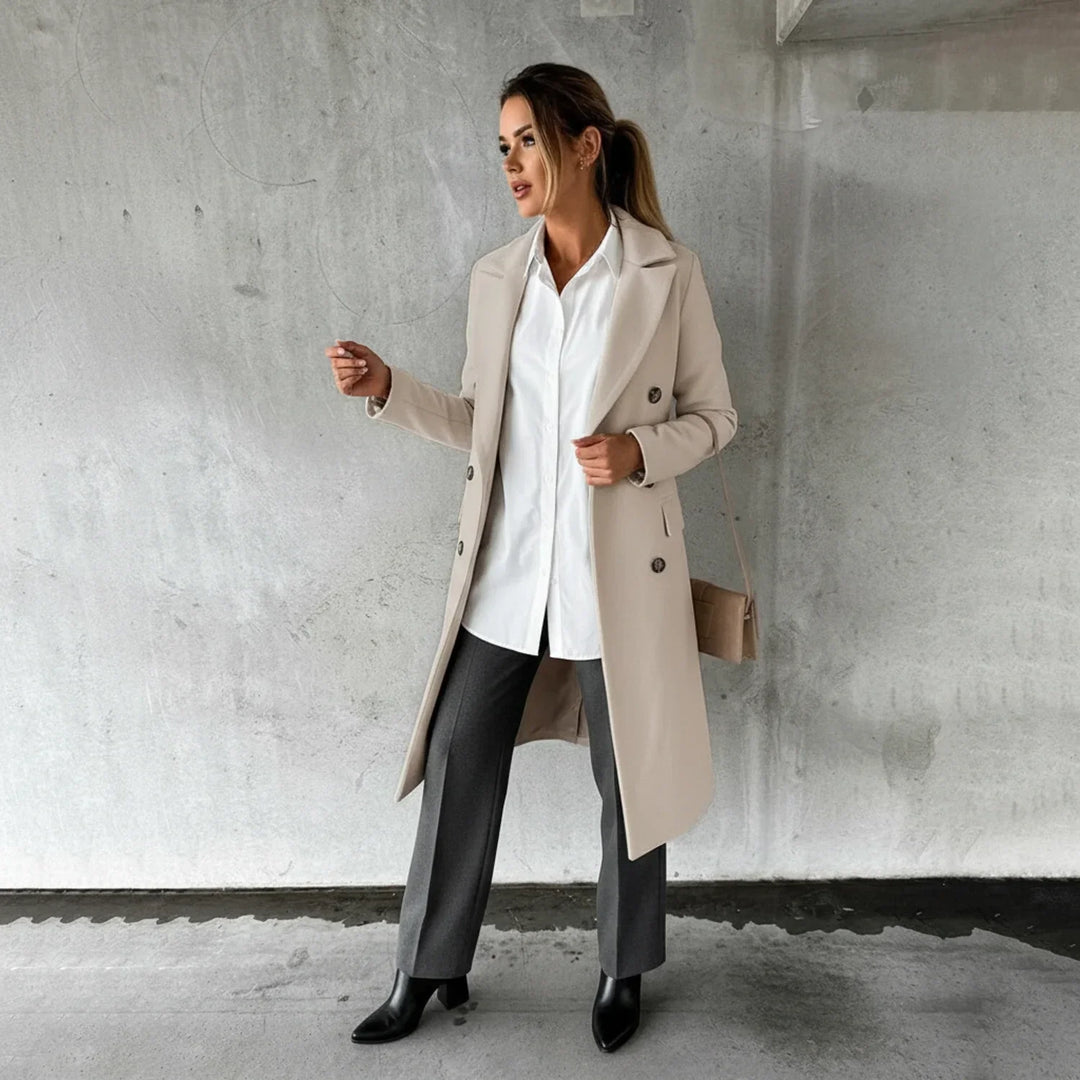 Women's elegant long double-breasted winter coat. Sophisticated knee-length outerwear for fall & winter fashion.