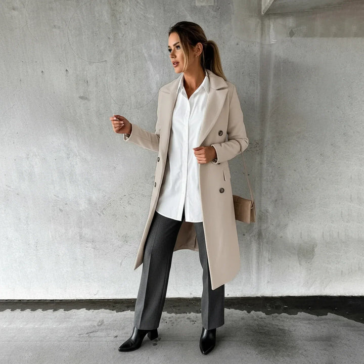 Women's elegant long double-breasted winter coat. Sophisticated knee-length outerwear for fall & winter fashion.