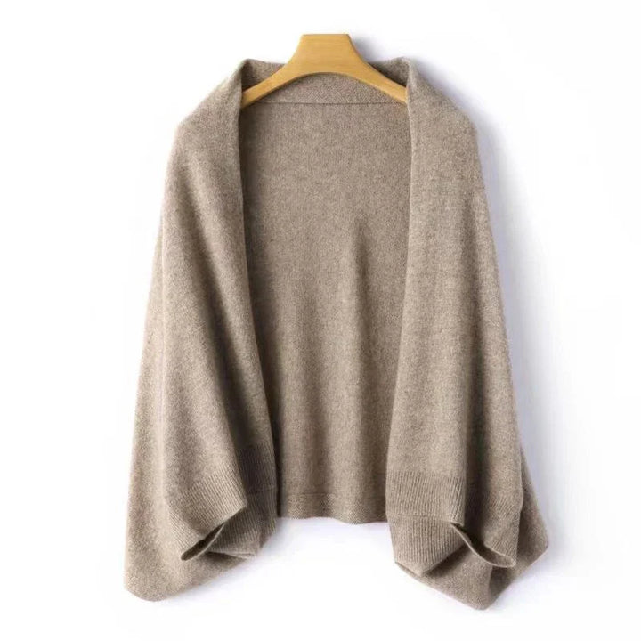 Soft women's pure wool wrap, perfect for cozy fashion and luxurious warmth. Elegant winter accessory.