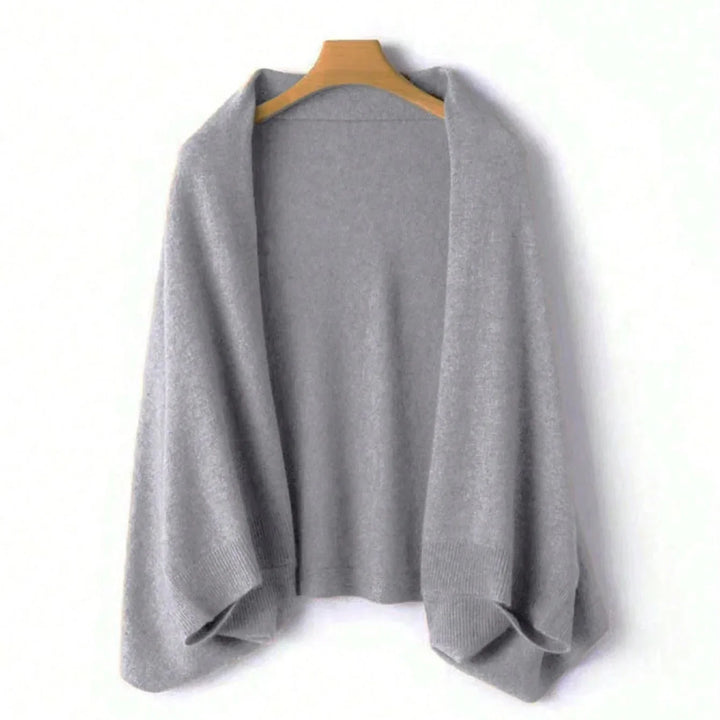 Premium pure wool women's wrap, providing luxurious comfort & a cashmere-like feel. Ideal for cozy winter fashion.