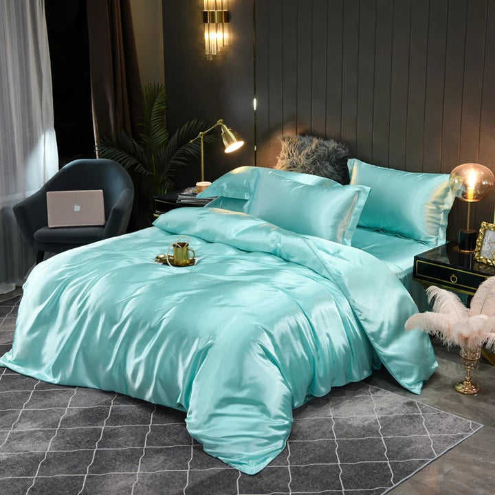 Experience ultimate comfort with this luxurious satin sheet and duvet set, perfect for a cozy bedroom.