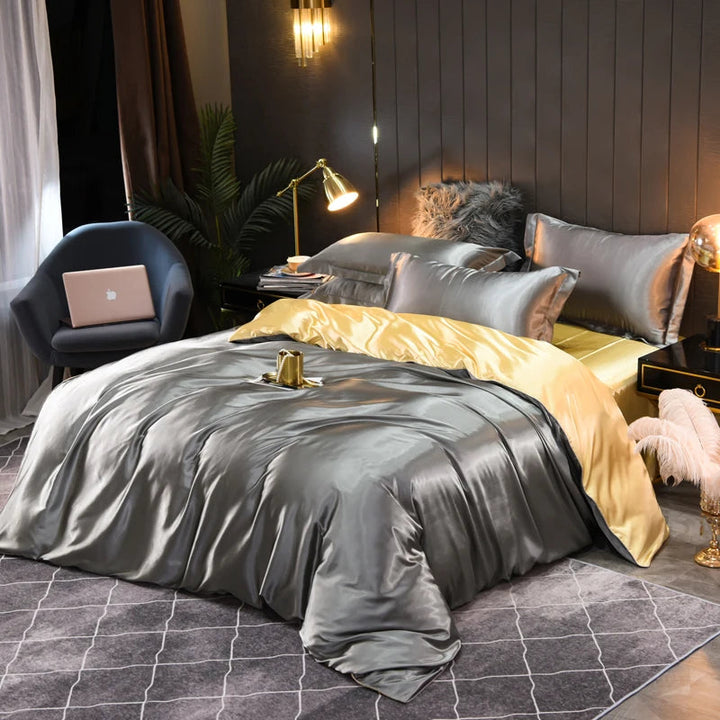 Beautifully styled bed with a luxurious satin bedding set, enhancing bedroom elegance & comfort.