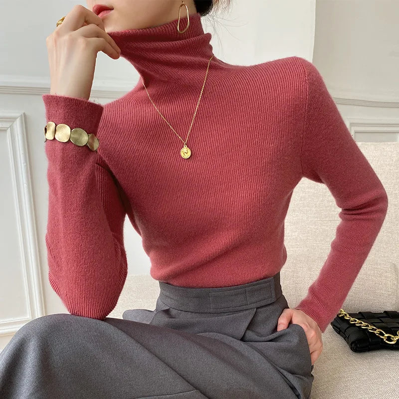 Cozy women's cashmere turtleneck sweater, a soft and warm knit ideal for luxurious winter layering.