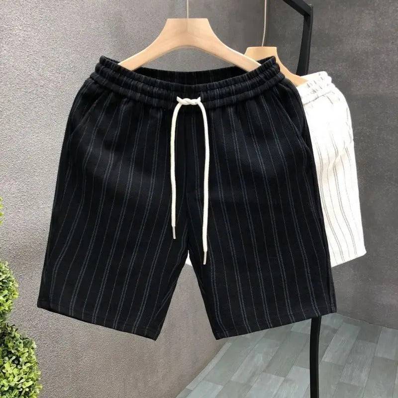 Men's tailored black pinstripe shorts with elastic waist & drawstring. Ideal for casual summer comfort.