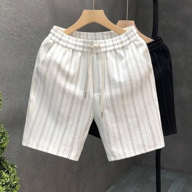 Men's ivory pinstripe shorts, relaxed fit with elastic waist and drawstring. Versatile for any occasion.