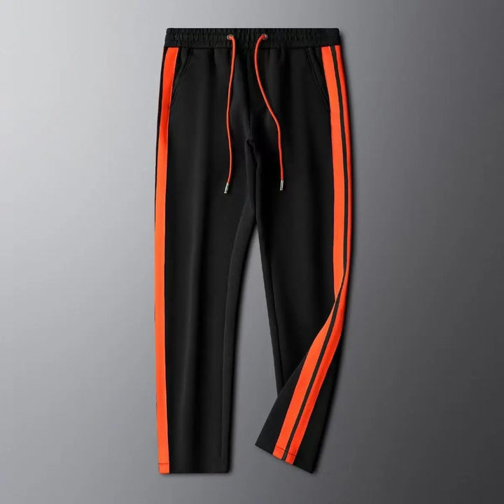 Men's leisure tracksuit featuring a practical zip-up jacket & trendy straight-leg pants. Great for daily wear.