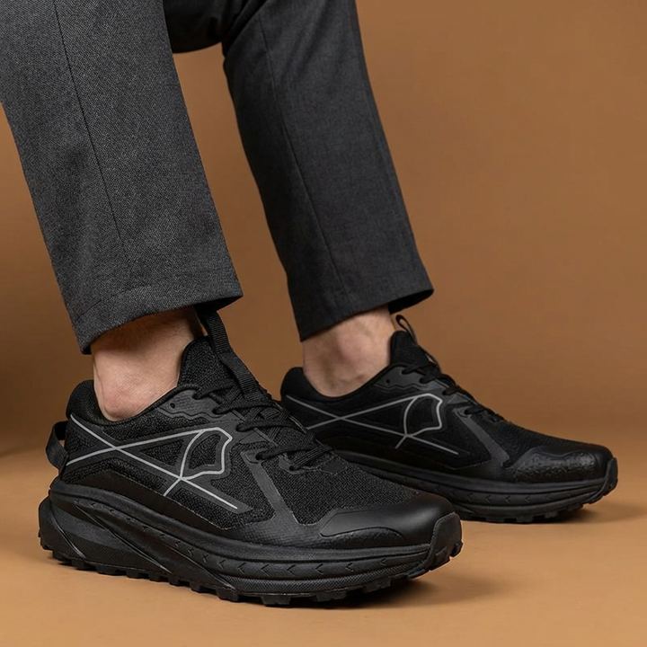 Pair of men's running shoes with a thick EVA sole for superior athletic comfort.