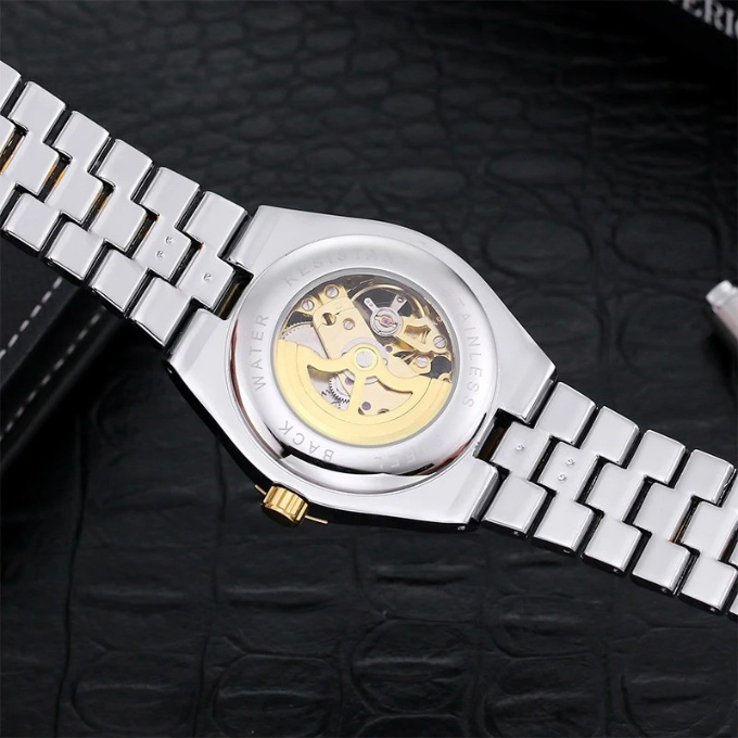 Stainless steel men's watch, automatic winding, full skeleton dial revealing internal gears.