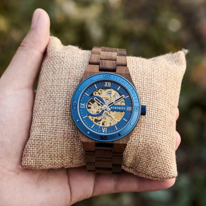 An automatic skeleton wood watch for men, perfect for adding a bohemian touch to any outfit.