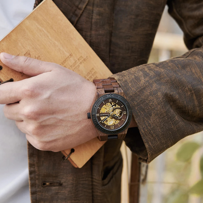 Men's mechanical wood watch, a sophisticated gift for him, showcasing its skeletonized dial.