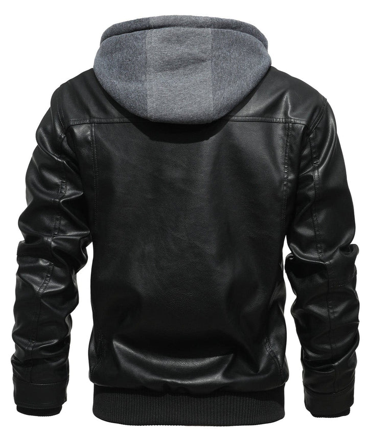 Close-up of men's bomber jacket in black, showing smooth PU leather texture and detachable hood zipper.