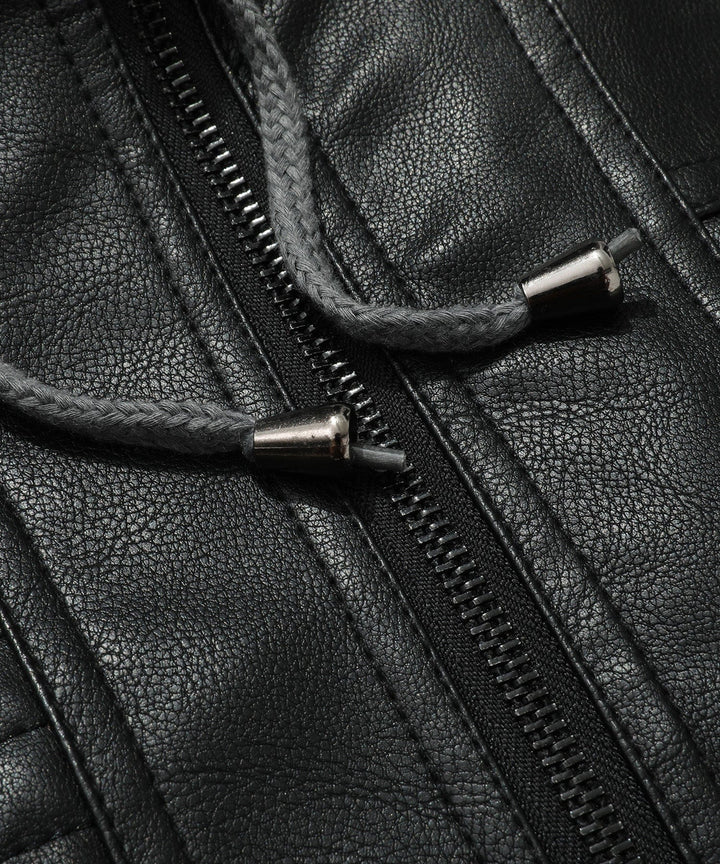 Detailed shot of pocket on men's bomber jacket, black PU leather, and secure zipper, casual style.