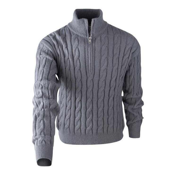 Stylish men wearing a navy blue cable knit quarter-zip sweater, a versatile fall pullover