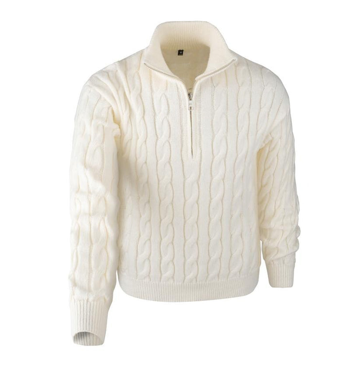 Detail of the quarter-zip closure on a men's beige cable knit merino wool blend sweater