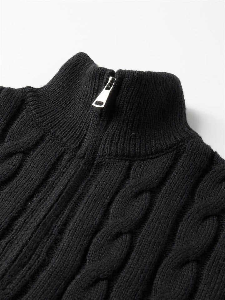 Front view of a classic men's cable knit quarter-zip sweater in an earthy tone, merino wool