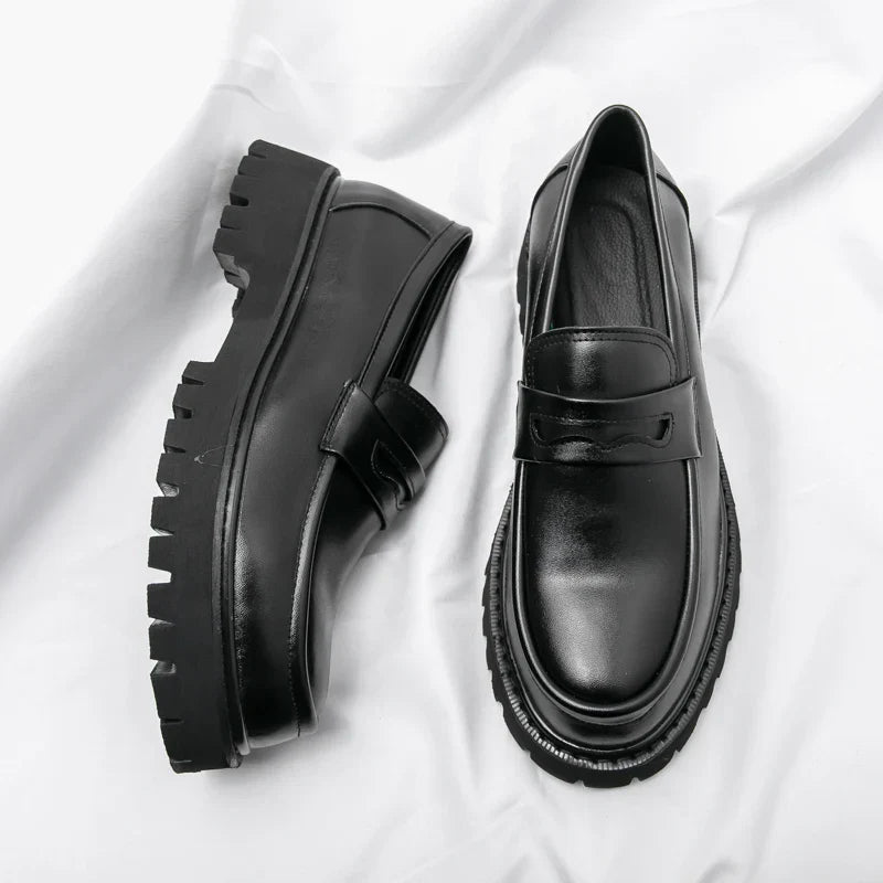 Men's black chunky sole loafers. Modern slip-on dress shoes for stylish men, comfortable & versatile fashion footwear.