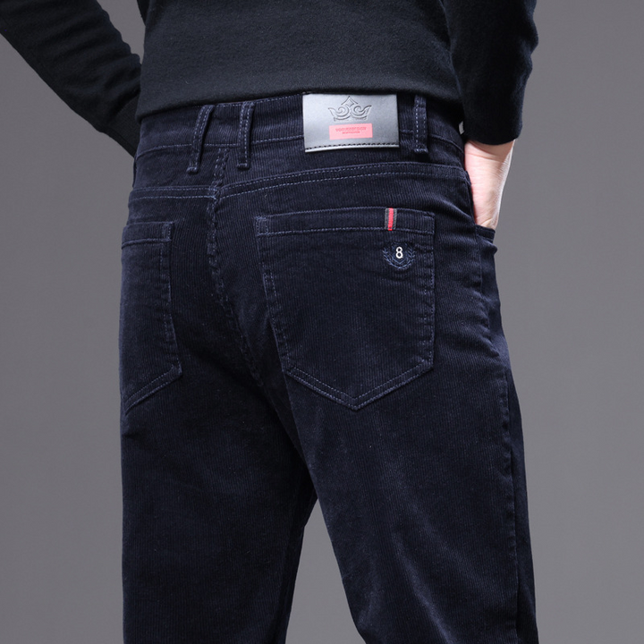 Stylish men's black corduroy bottoms, featuring a tailored fit for a contemporary fashion look.